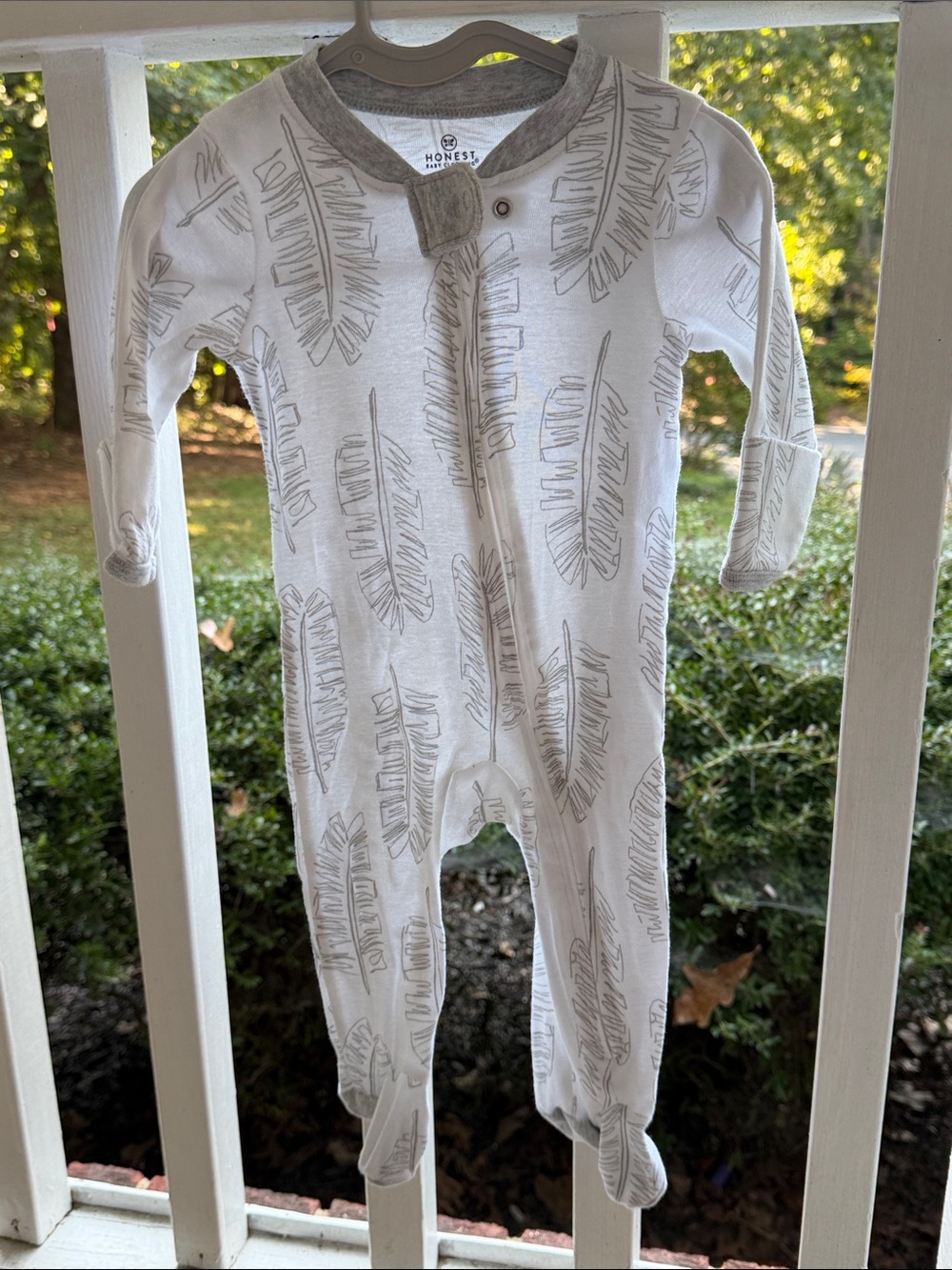 The Honest Company White Footed One-Piece with Gray Feather Print